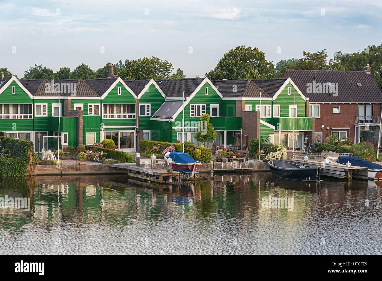 The Zaanse Schans with its typical green wooden houses, bridges and ditches. Stock Photo