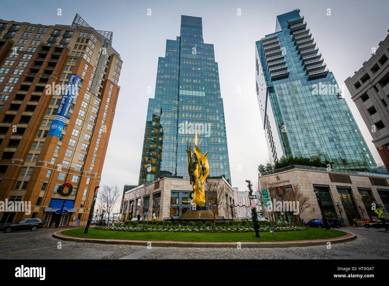 The National Katyń Memorial and modern buildings in Harbor East, Baltimore, Maryland. Stock Photo