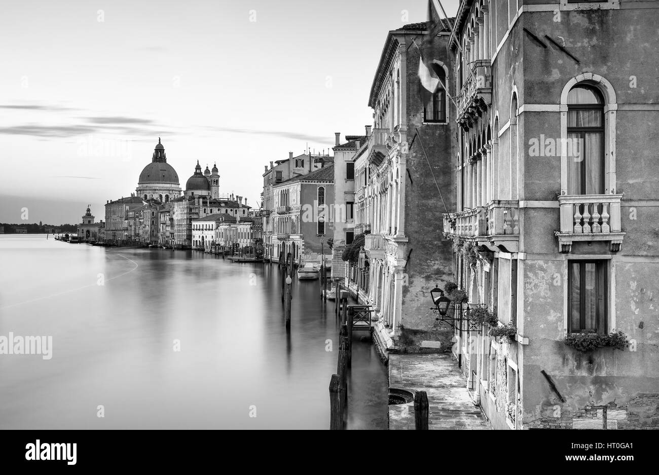 Canal Grande with Basilica Santa Maria della Salute in the background as seen from Ponte dell Accademia, Venice, Italy Stock Photo