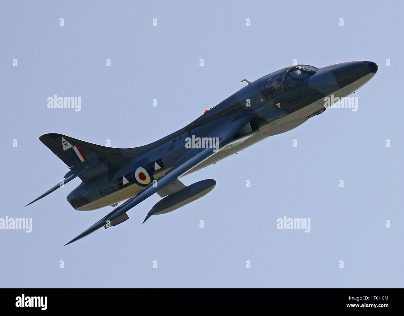 Hawker Hunter G-BXFI performing a fast pass at Jersey Air Display in September 2014 Stock Photo