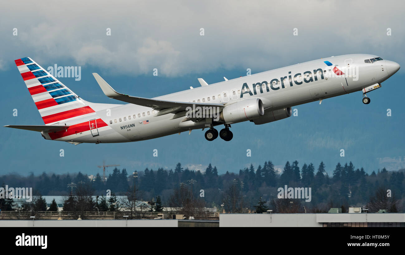 American Airlines plane Boeing 737 (737-800) narrow-body jet airliner airborne take taking off Vancouver International Airport Stock Photo