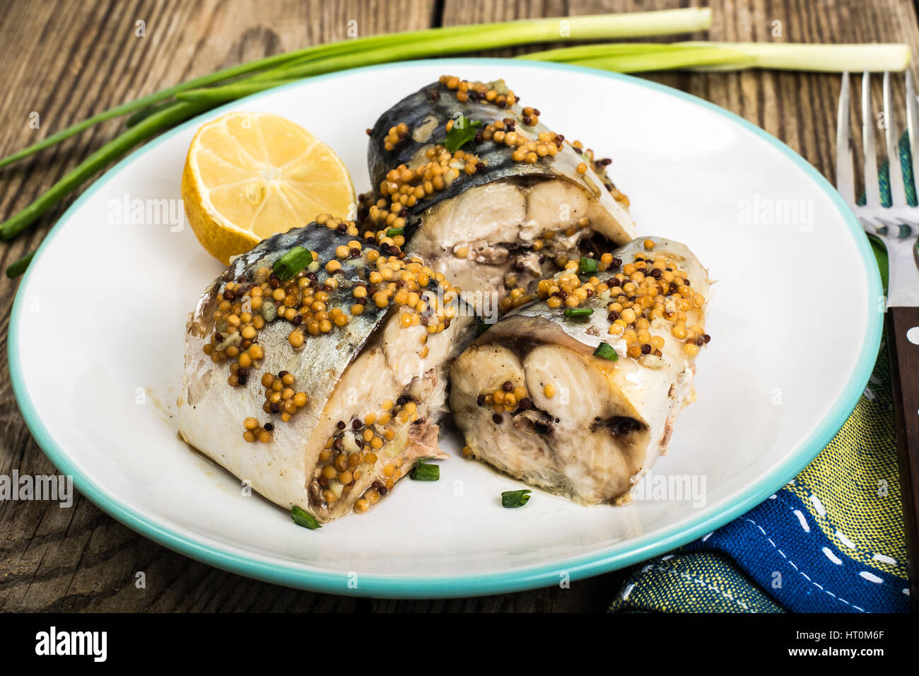 Baked mackerel with mustard seeds Stock Photo Alamy