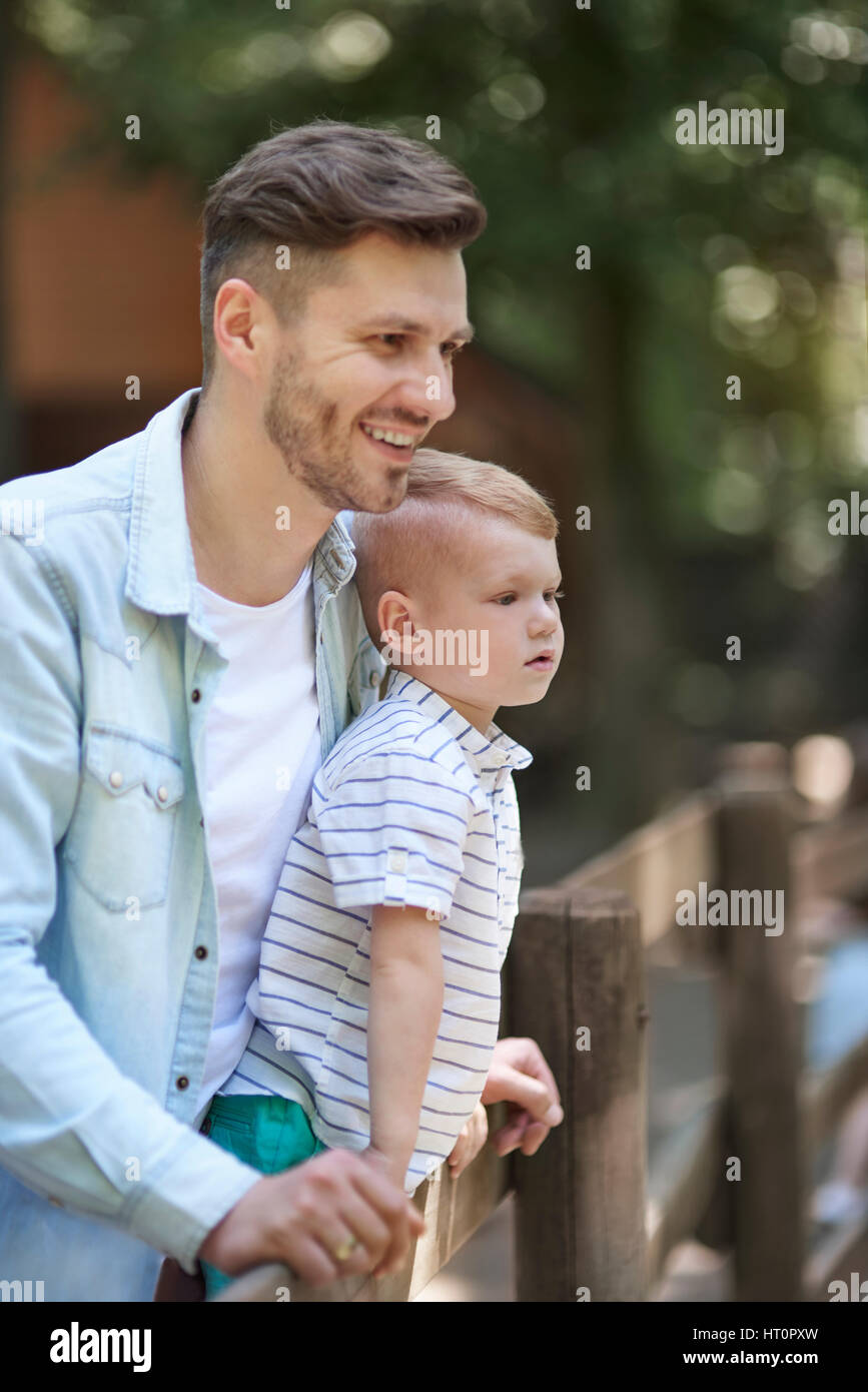 Enjoying The Time With Daddy At The Zoo Stock Photo Alamy