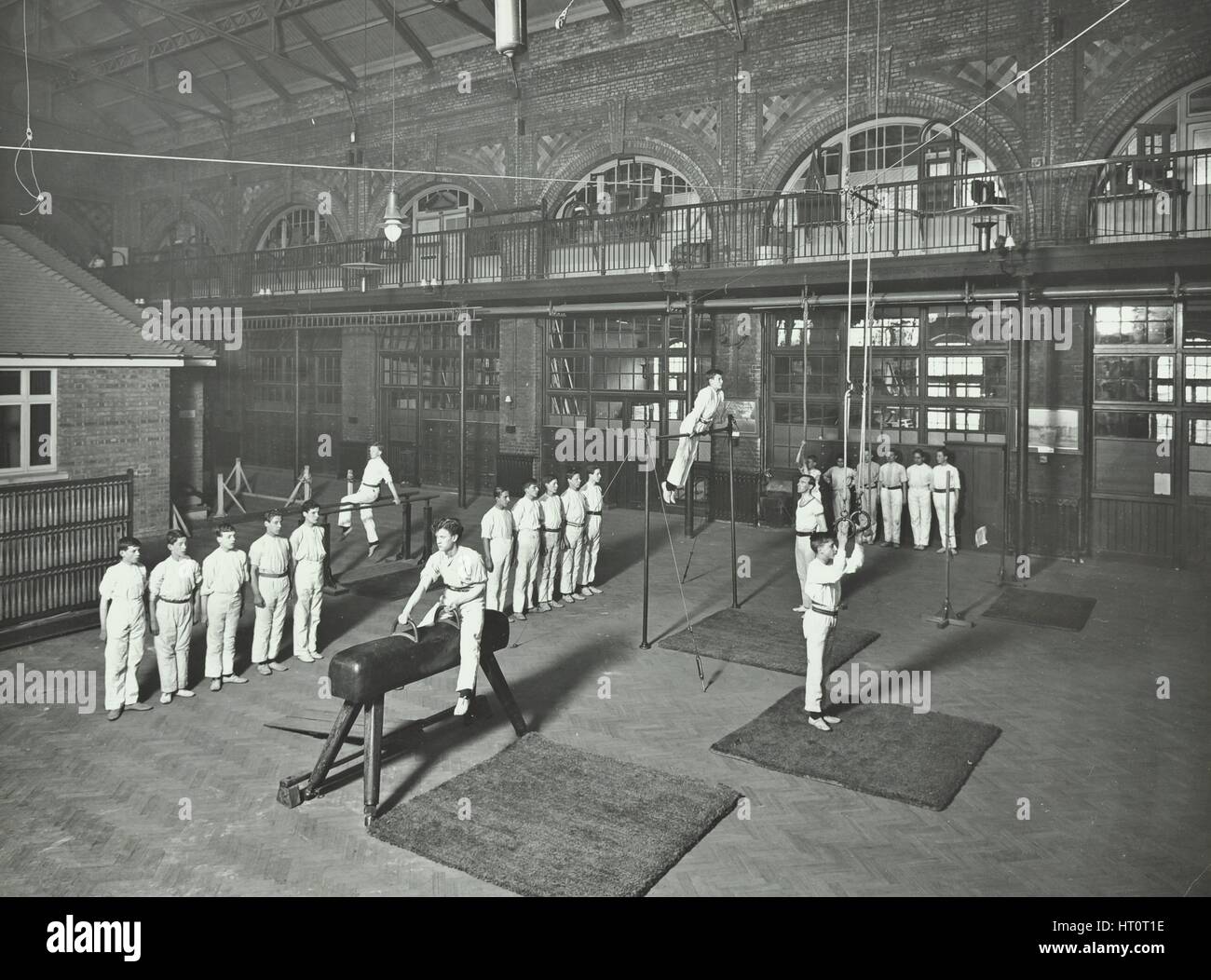 Gymnastics by male students, School of Building, Brixton, London, 1914. Artist: Unknown. Stock Photo