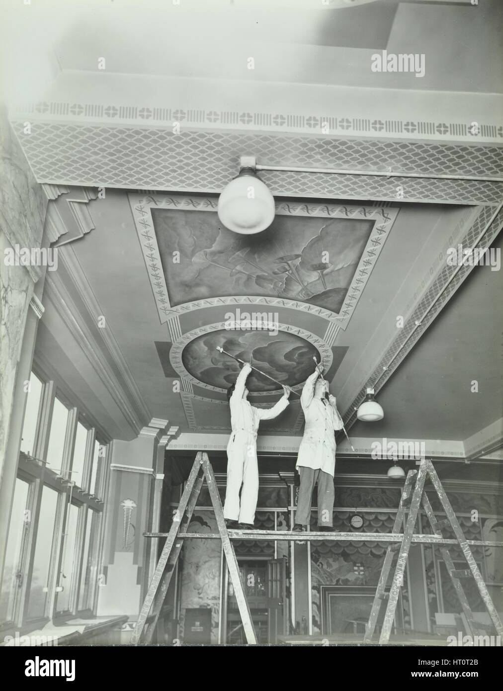 Students painting a design on the ceiling, School of Building, Brixton, London, 1939.  Artist: Unknown. Stock Photo