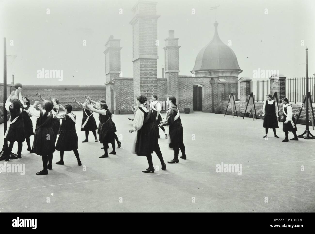 Playing netball, Myrdle Street Girls School, Stepney, London, 1908. Artist: Unknown. Stock Photo