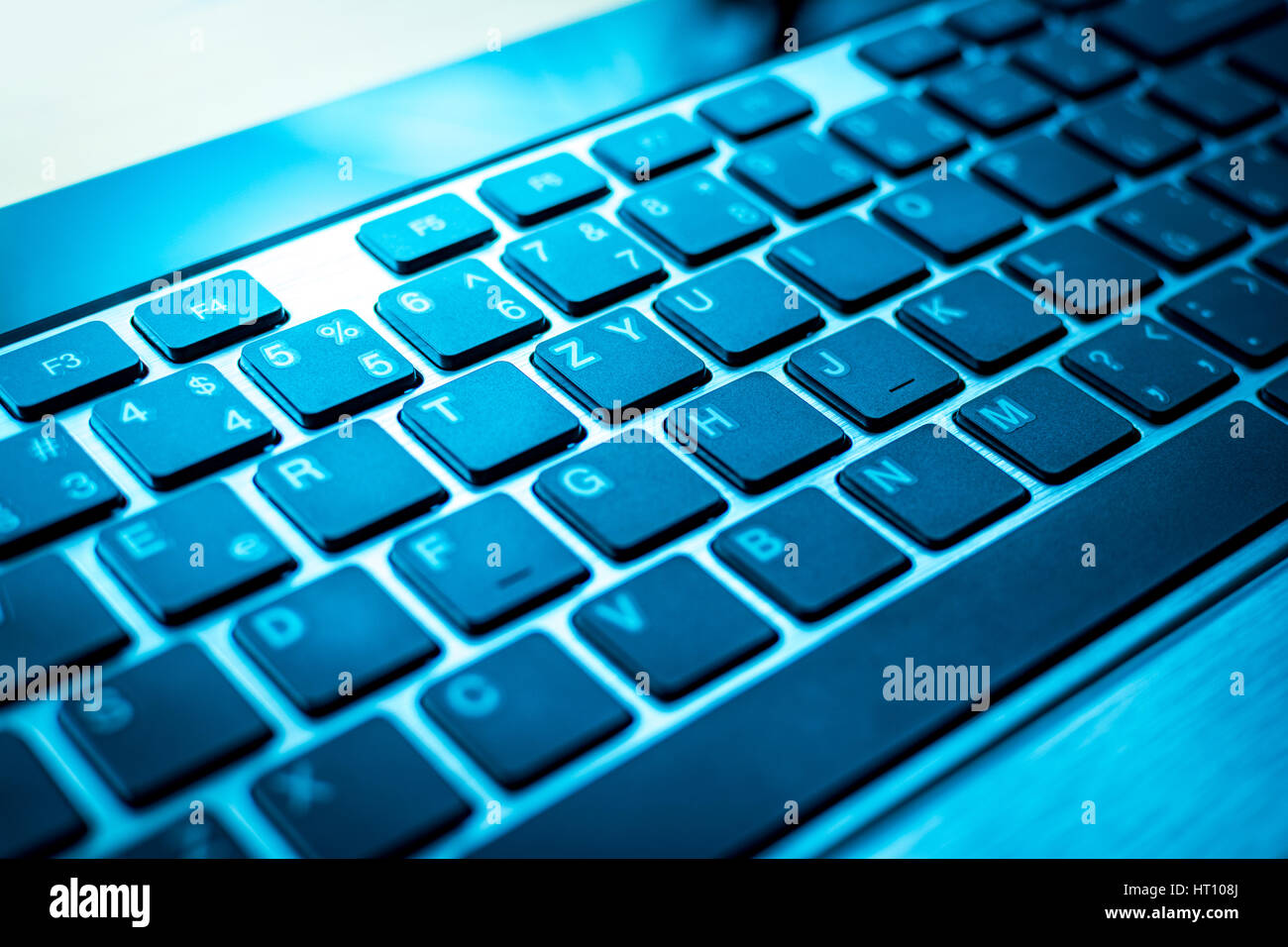 Blue keyboard wirh black keys of computer or laptop Stock Photo - Alamy