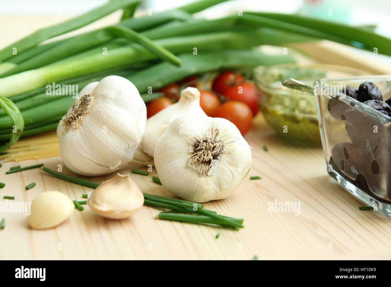 garlic cloves, onion and tomatoes Stock Photo
