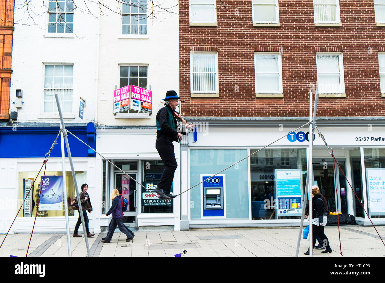 Tight Rope Playing Instruments On tightrope hi-res stock photography and images - Alamy