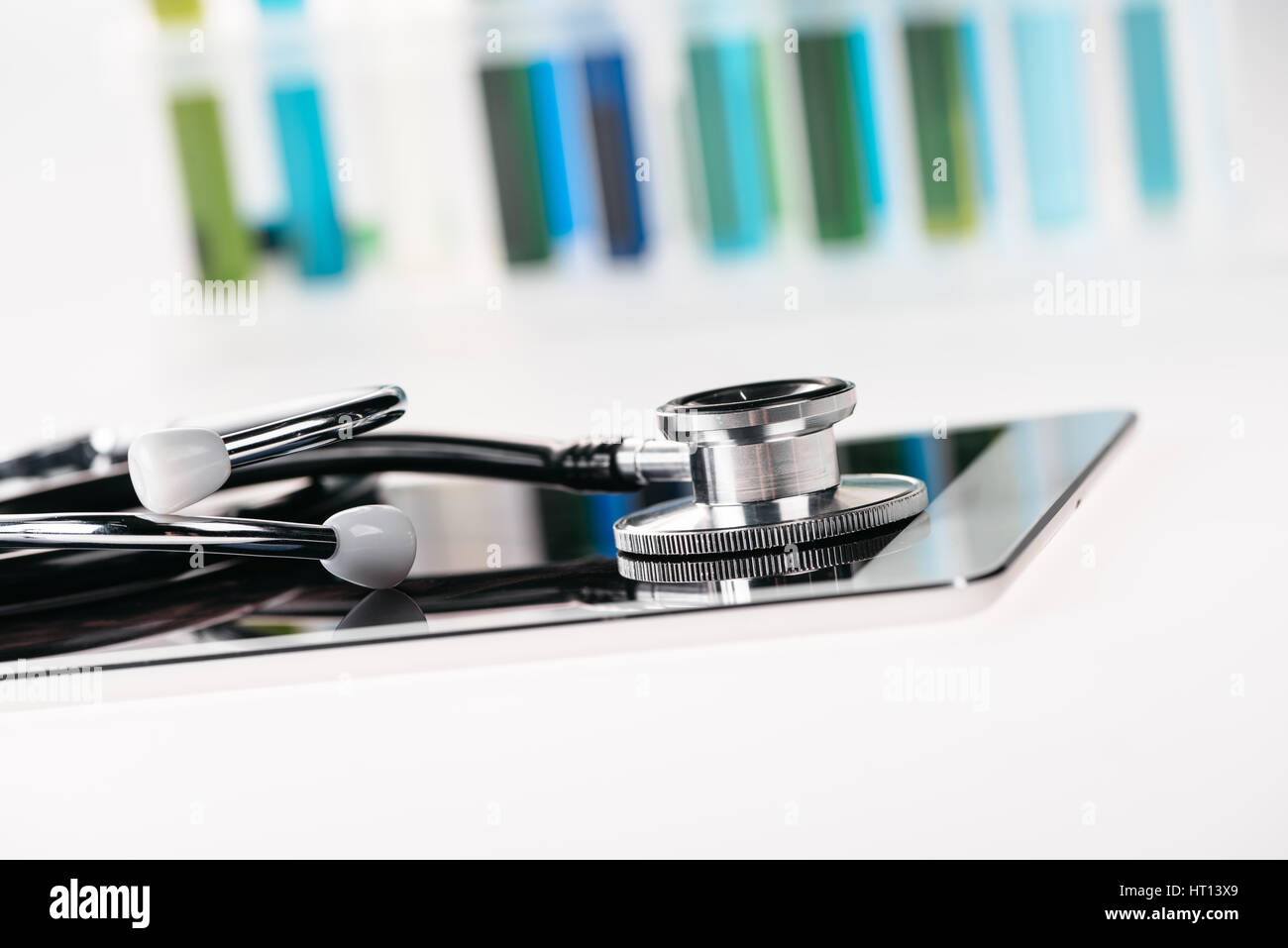 close up view of stethoscope on digital tablet on white Stock Photo - Alamy
