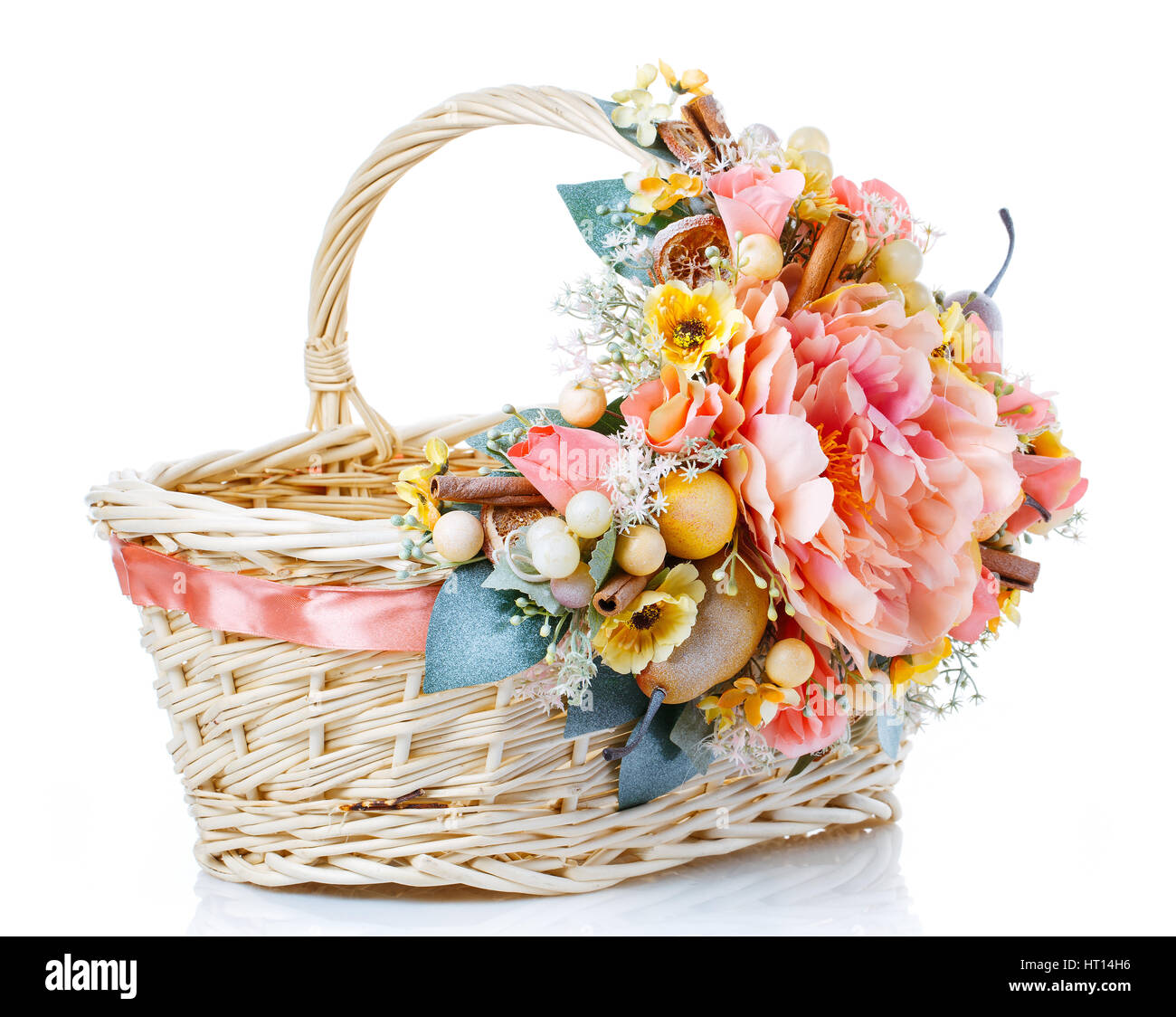 wicker basket decorated with flowers isolated on white Stock Photo - Alamy