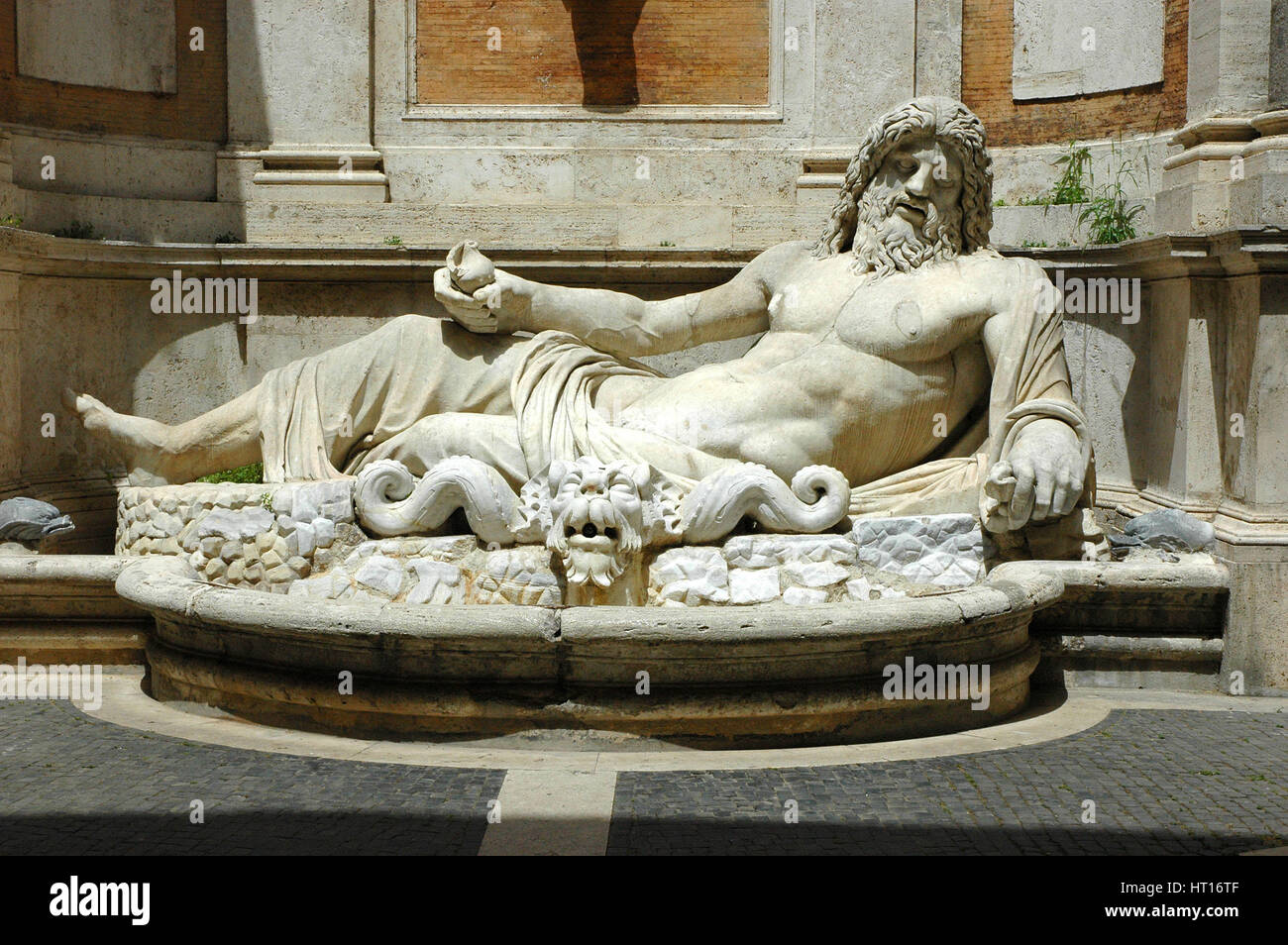 Colossal fountain of Marforio, the river god, restored as Oceanus. One of the five talking statues  Artist: Werner Forman. Stock Photo