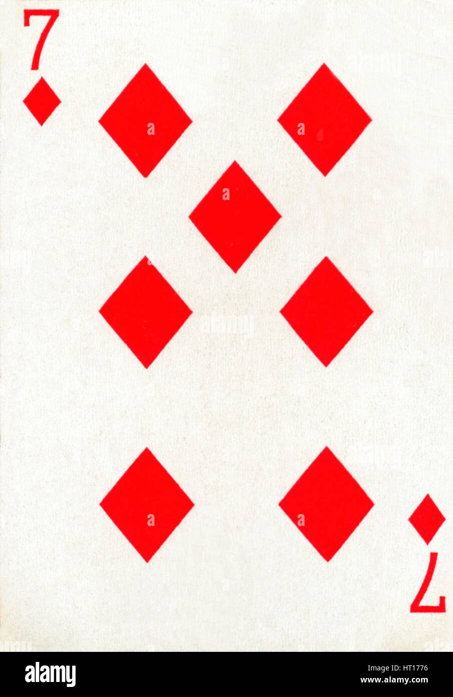 7 of Diamonds from a deck of Goodall & Son Ltd. playing cards, c1940.  Artist: Unknown. Stock Photo