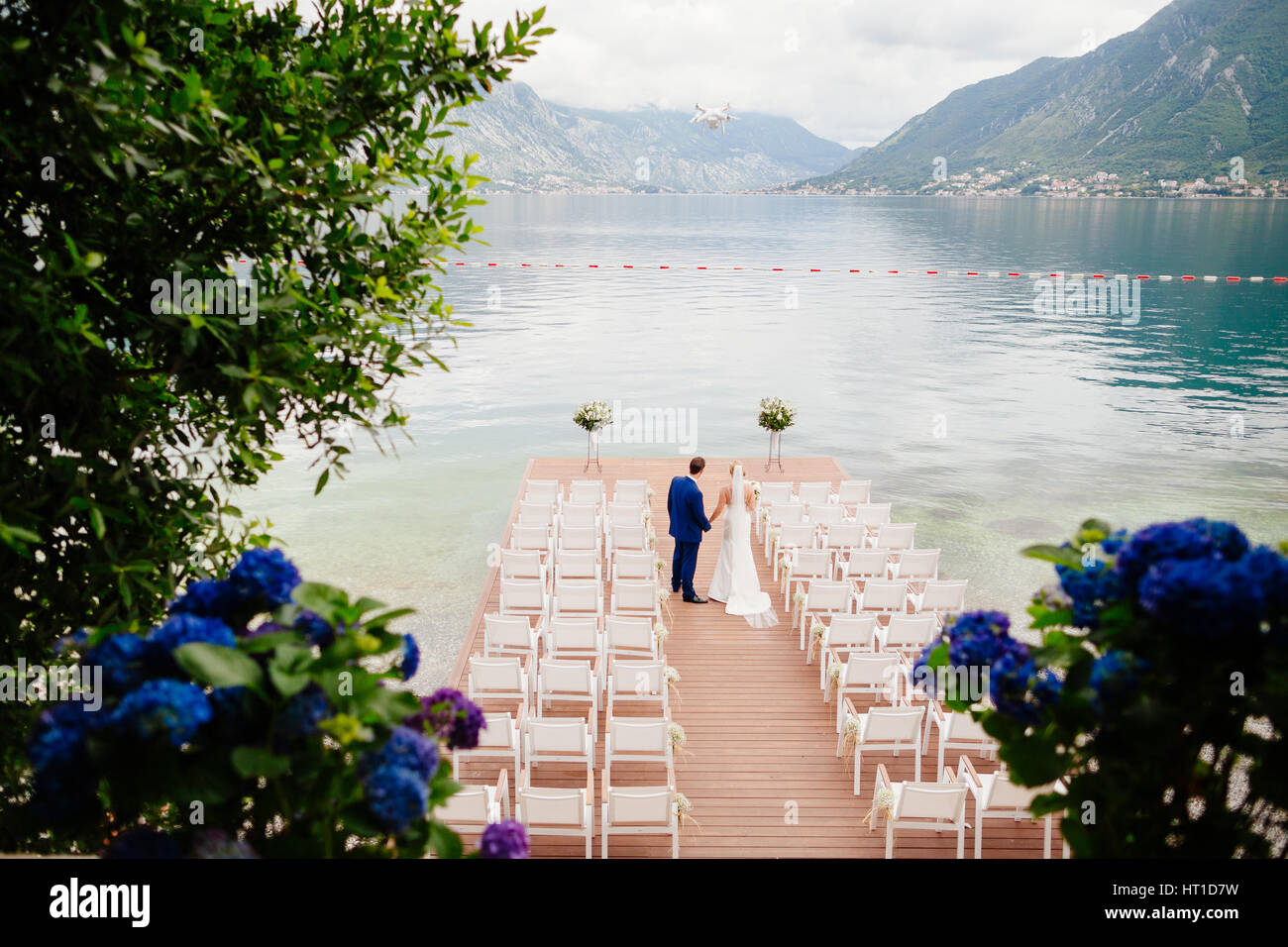 Wedding Couple At Destination Wedding Ceremony Mountains And Sea