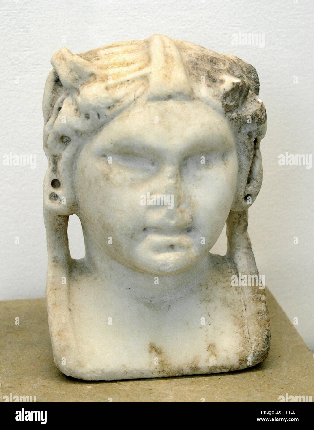 Hermes with attributes of the god Bacchus. Antonina era. 2nd century AD. It was probably a table stand. Tarragona, Spain. National Archaeological Museum. Tarragona. Catalonia, Spain. Stock Photo