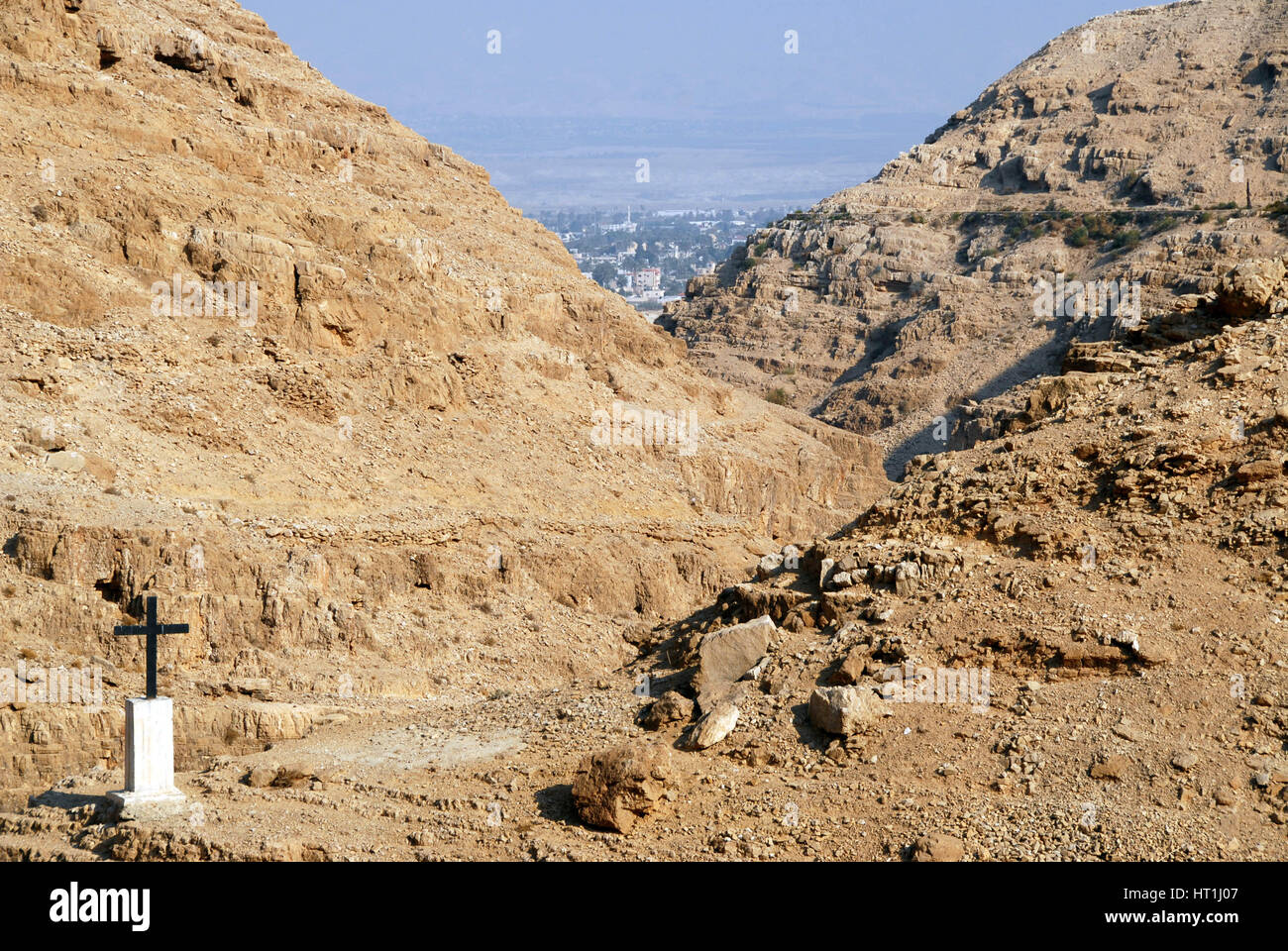 Wadi Qelt is a valley running west to east across the Judean desert in the West Bank, in the background the city of Jericho, Palestine West Jordan Lan Stock Photo