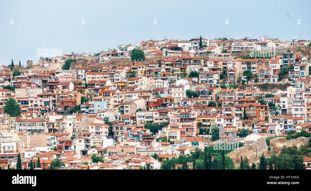 Aerial panoramic view of the colorful Thessaloniki city. Houses with red tile roofs are arranged in rows on a hill. Greece Stock Photo