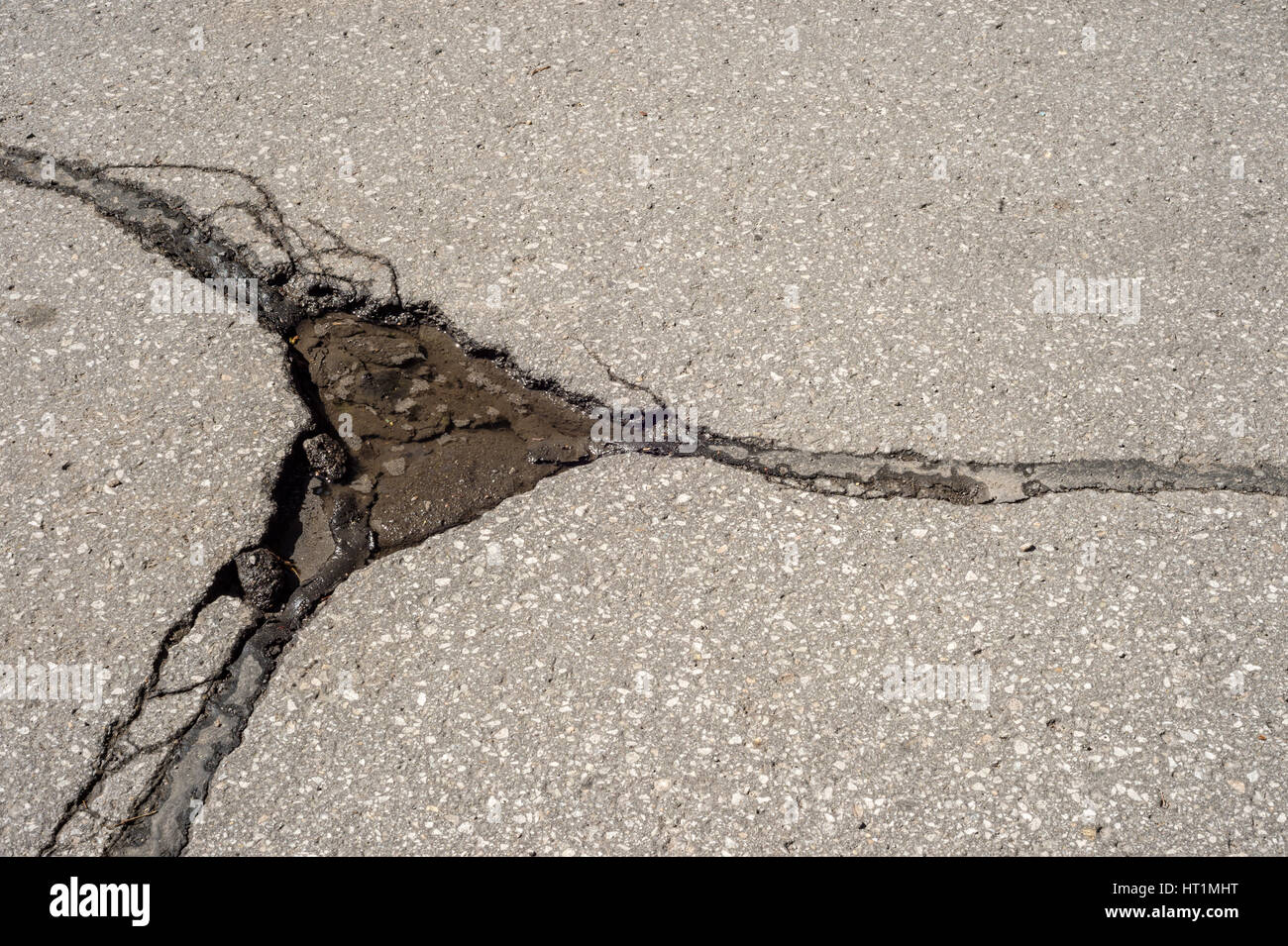 Large deep pothole in Montreal street, Canada. Stock Photo