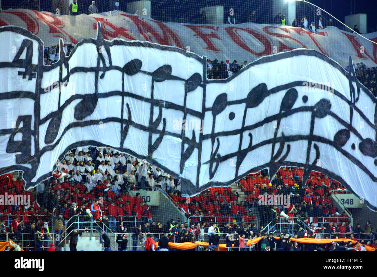BUCHAREST - APRIL 17: Choreography of soccer fans of Dinamo Bucharest during a match against Steaua Bucharest, in the National Arena stadium, final sc Stock Photo