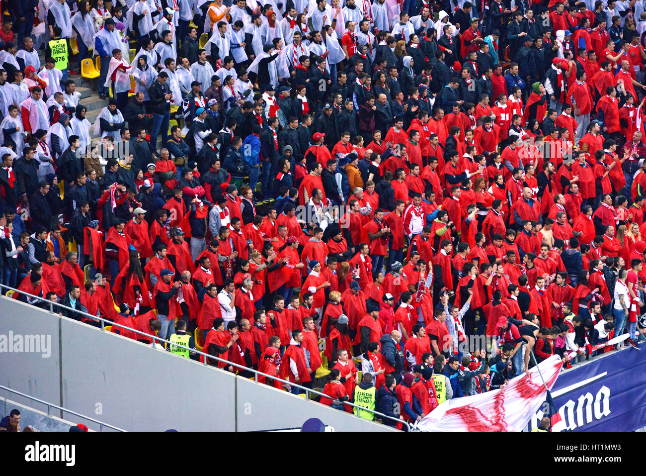 BUCHAREST - APRIL 17: Football fans of Dinamo Bucharest during a match against Steaua Bucharest, in the National Arena stadium, final score: 1-1. On A Stock Photo