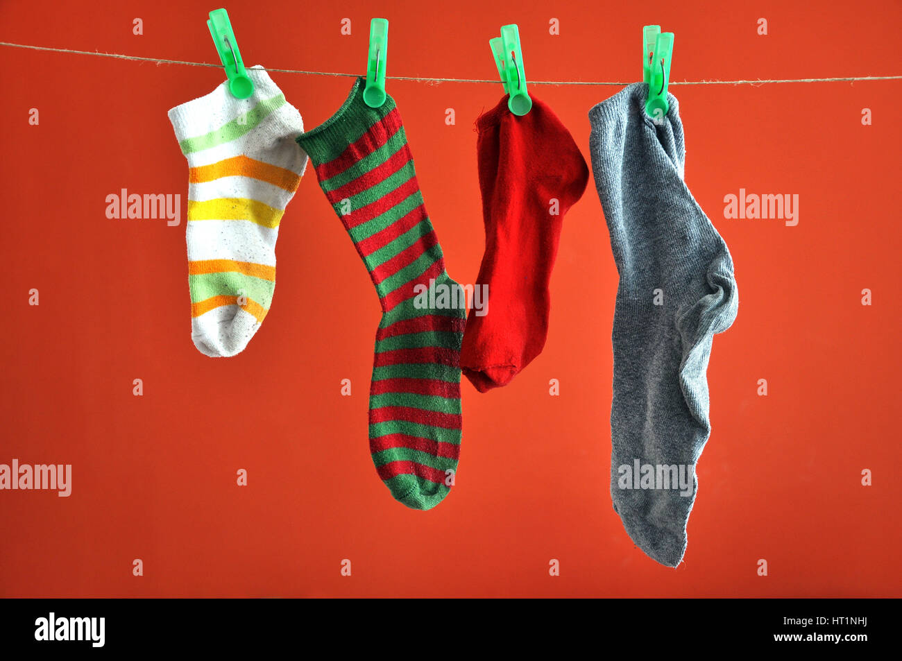 Socks hanging on a rope Stock Photo