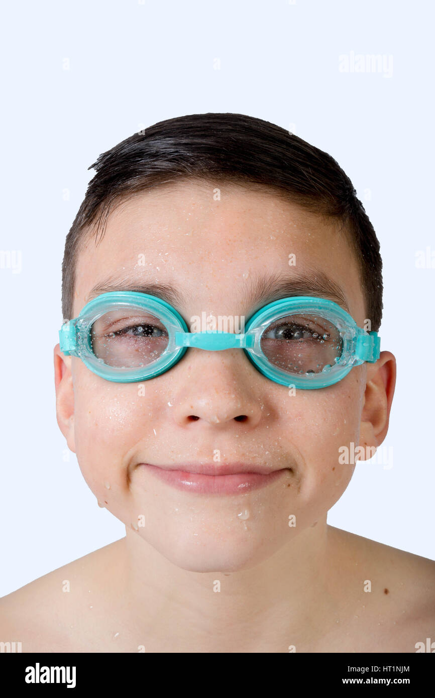 Teenage boy wearing swimming goggles Stock Photo Alamy