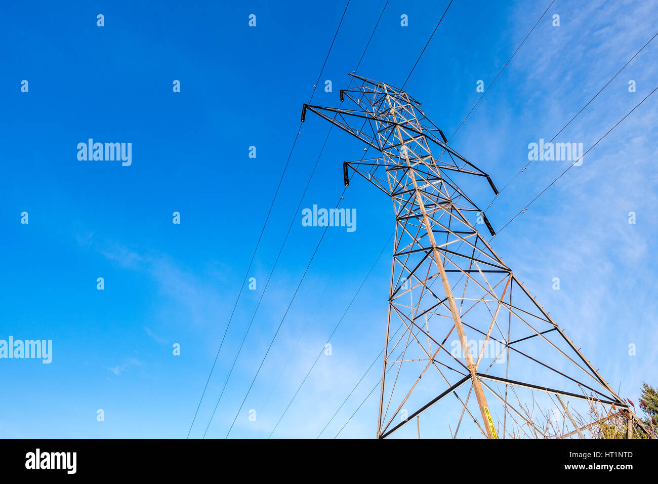 A hydro tower with power lines and insulators Stock Photo - Alamy