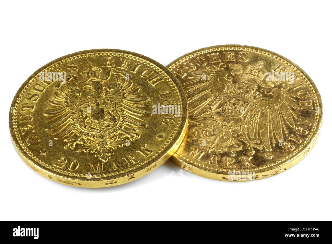 Hamburg gold coins (German Empire Goldmark) with older and younger type of Eagle isolated on white background Stock Photo