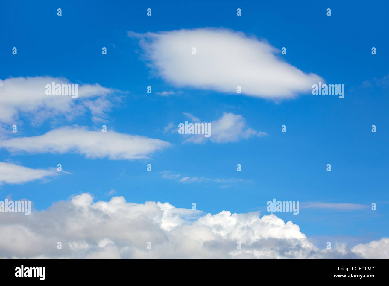 Blue sunny sky with white clouds background Stock Photo - Alamy