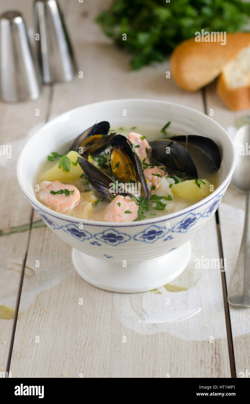 Freshly made creamy fish and mussel soup Stock Photo Alamy