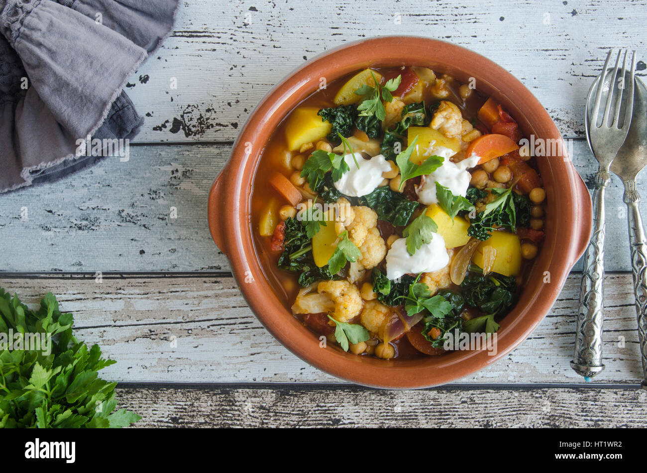 Moroccan chickpea and cauliflower tagine with couscous Stock Photo Alamy