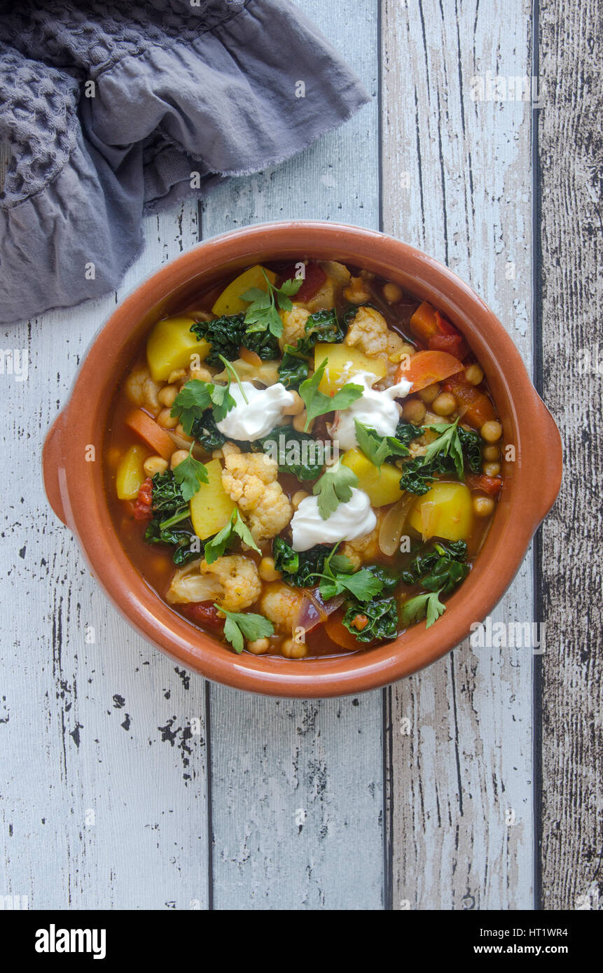 Moroccan chickpea and cauliflower tagine with couscous Stock Photo Alamy