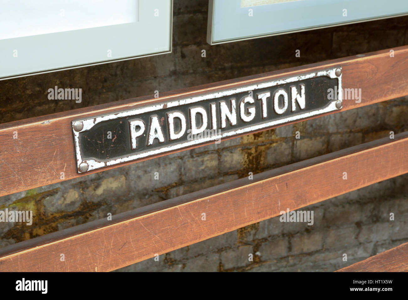 Paddington Railway Station sign on wooden bench Stock Photo Alamy