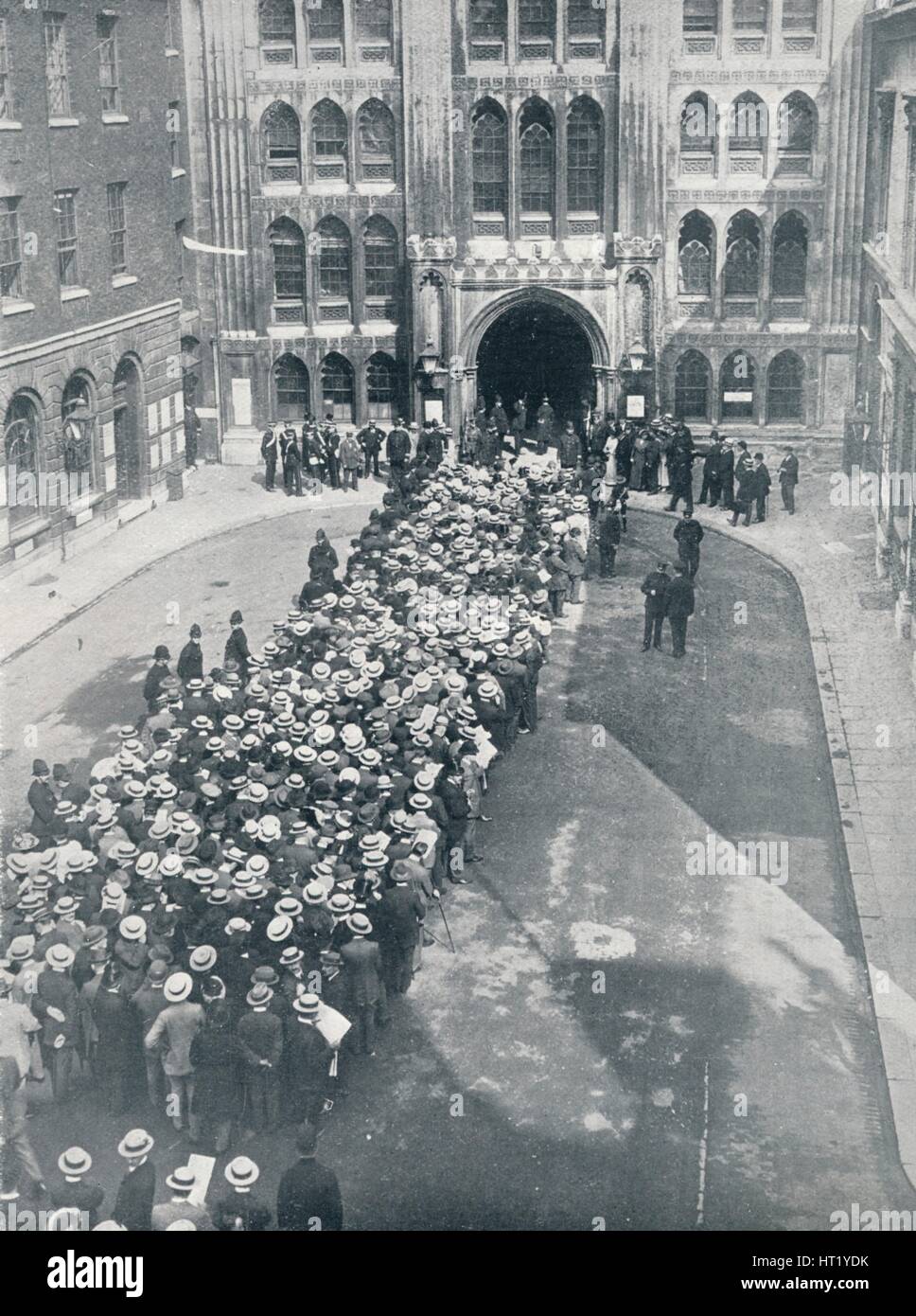 Waiting to enter the Guildhall for Mr. Asquith's first great call to arms meeting, 1914. Artist: Unknown Stock Photo