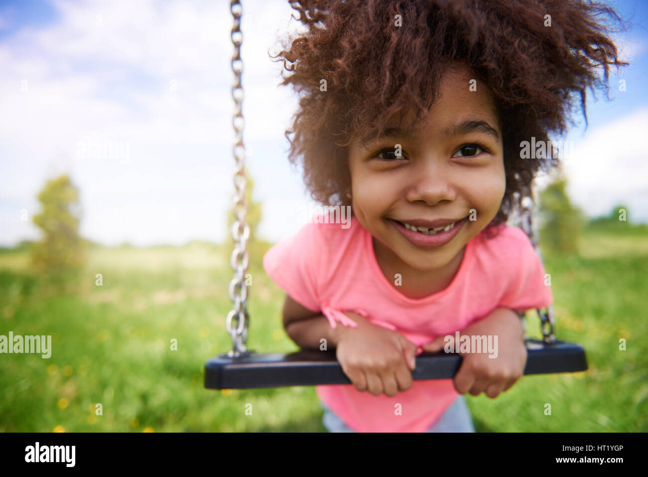 Little girl on the playground Stock Photo - Alamy