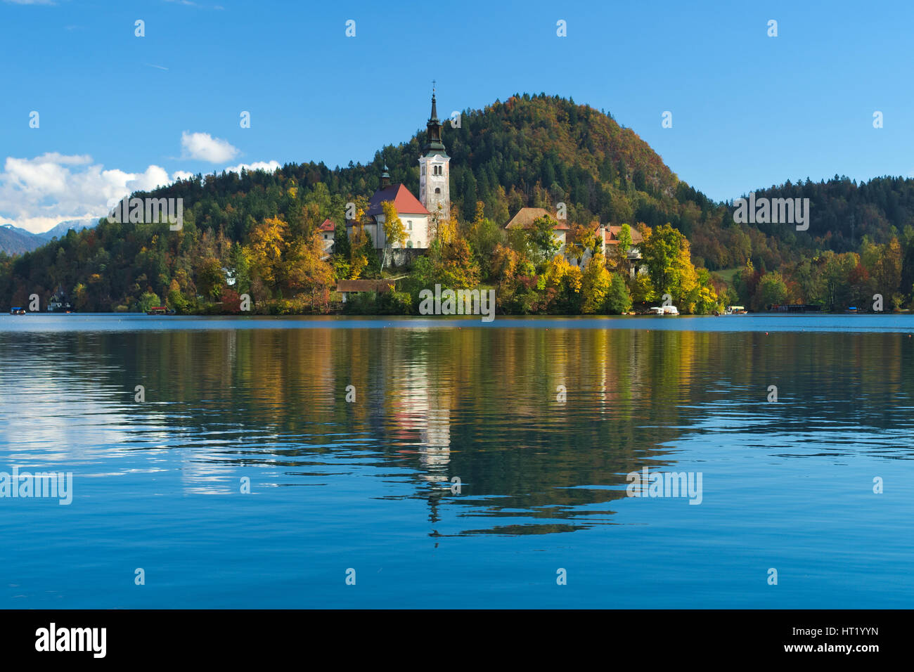 View of the castle and of the Church of the Assumption in the island of the Lake of Bled (Blejsko jezero), Slovenia Stock Photo