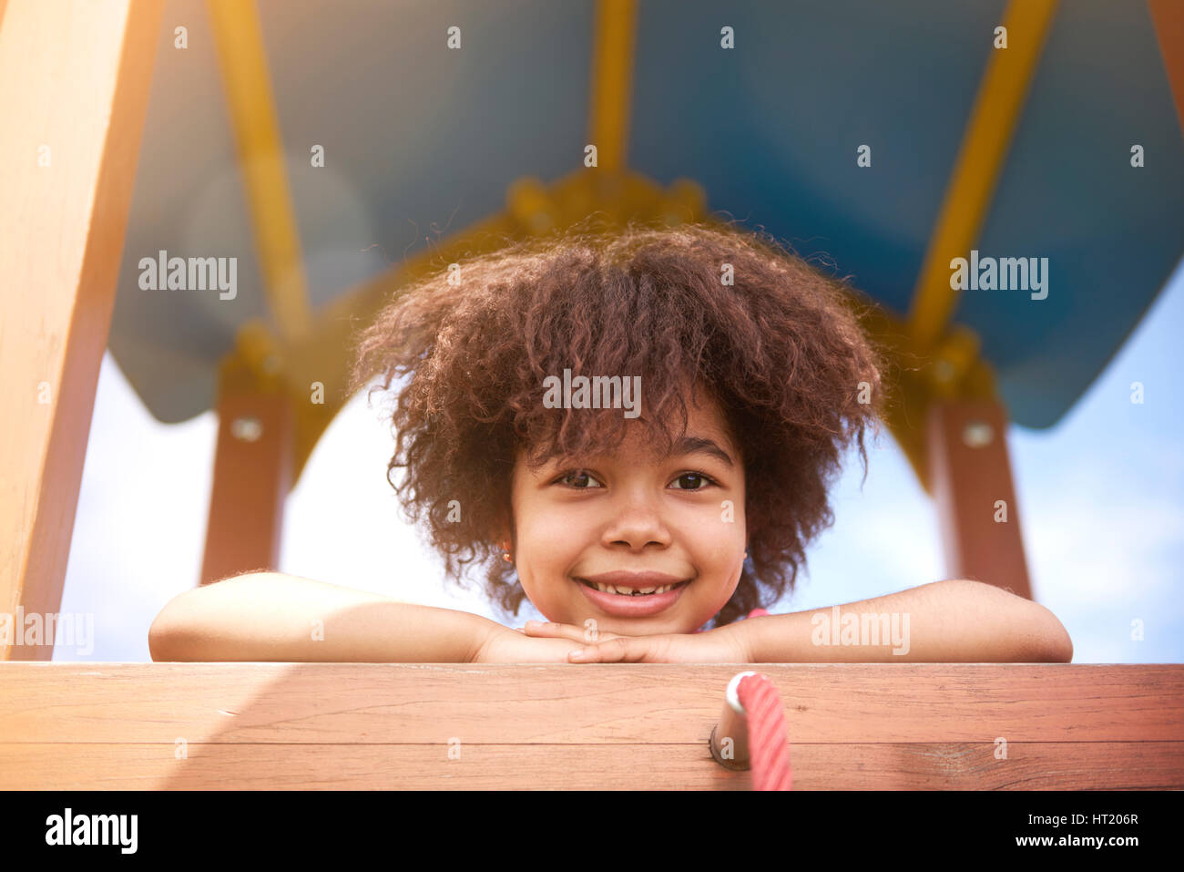 Happy little girl at the playground Stock Photo - Alamy
