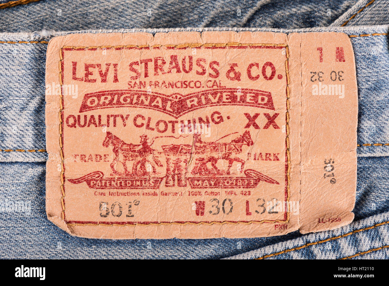 BANGKOK, THAILAND - DECEMBER 09 2014: Close up of the LEVI'S leather label  on the old blue jeans. LEVI'S is a brand name of Levi Strauss and Co, found  Stock Photo - Alamy