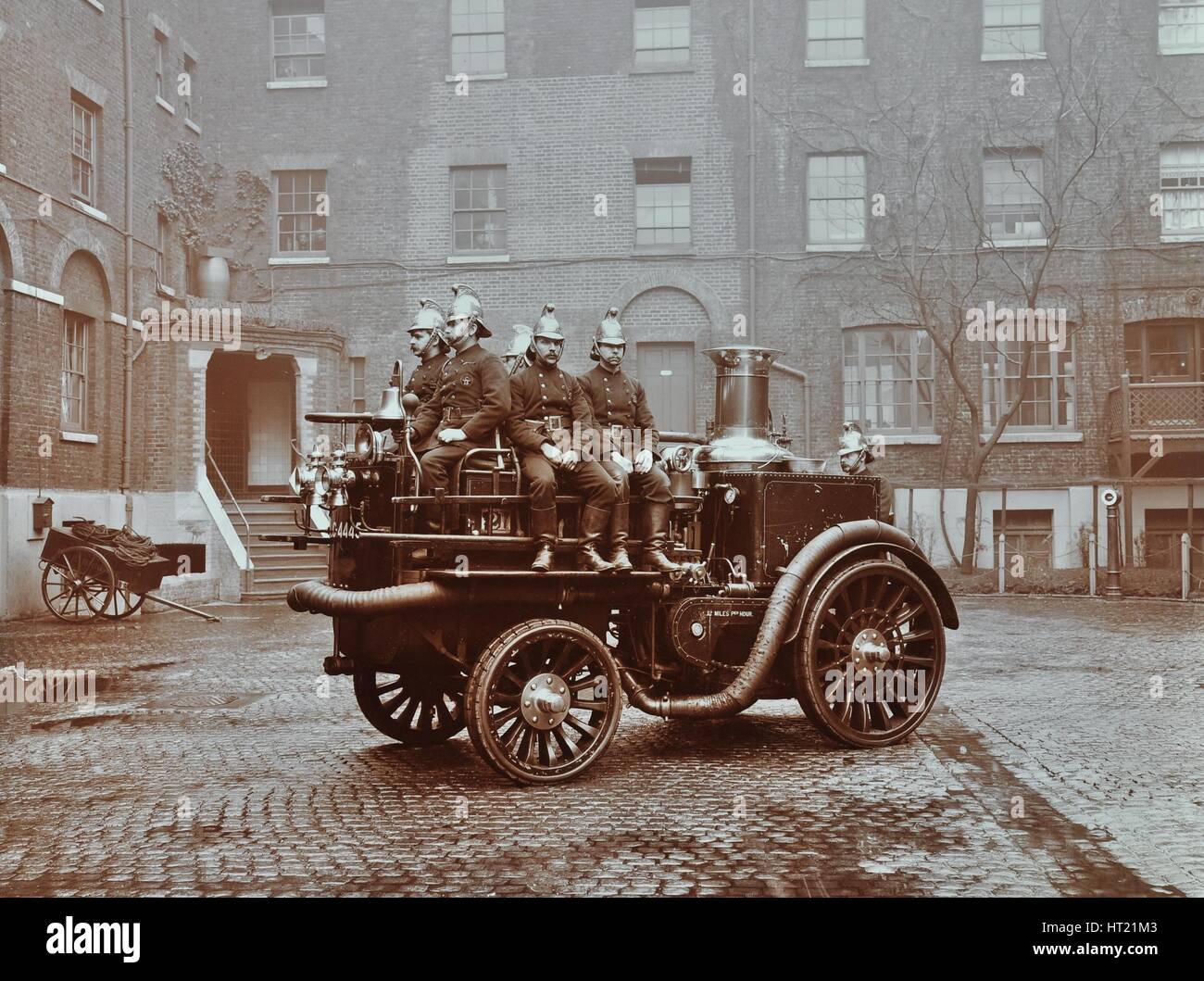 Firemen aboard a motor steamer, London Fire Brigade Headquarters ...
