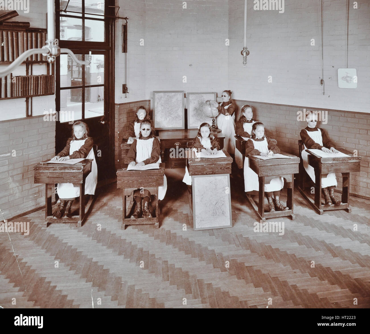 Geography lesson at Elm Lodge Residential School for Elder Blind Girls, London, 1908. Artist: Unknown. Stock Photo