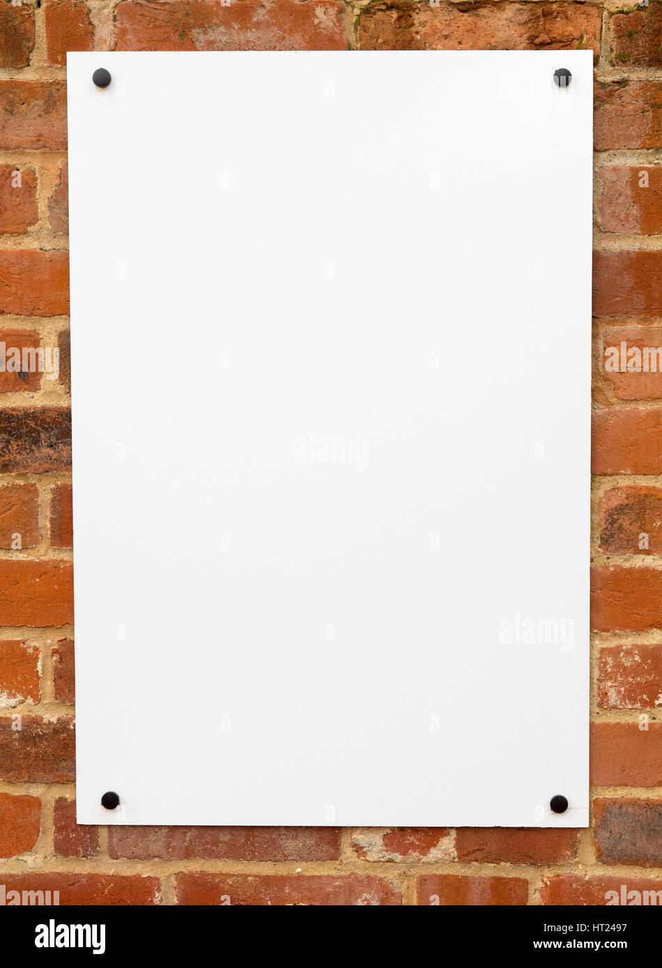 Large blank white sign on a wall ready for text. Stock Photo