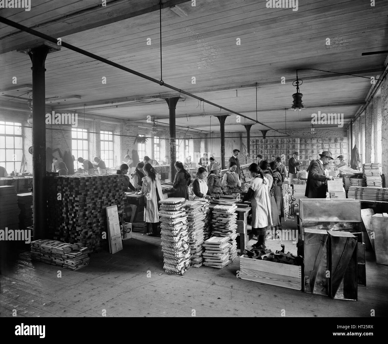 Making ammunition cases, Waring and Gillow factory, Lancaster, Lancashire, January 1917. Artist: H Bedford Lemere. Stock Photo