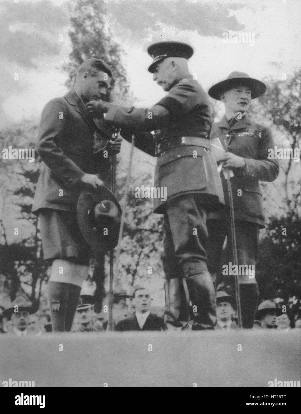 The Prince of Wales being invested with the Silver Wolf by the Duke of Connaught, 1922 (1936). Creator: Unknown. Stock Photo
