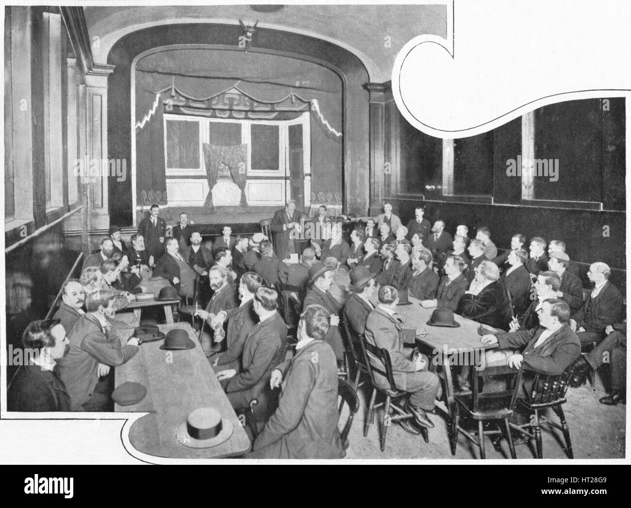 A discussion at the Eleusis Club, London, c1903 (1903). Artist: Unknown. Stock Photo