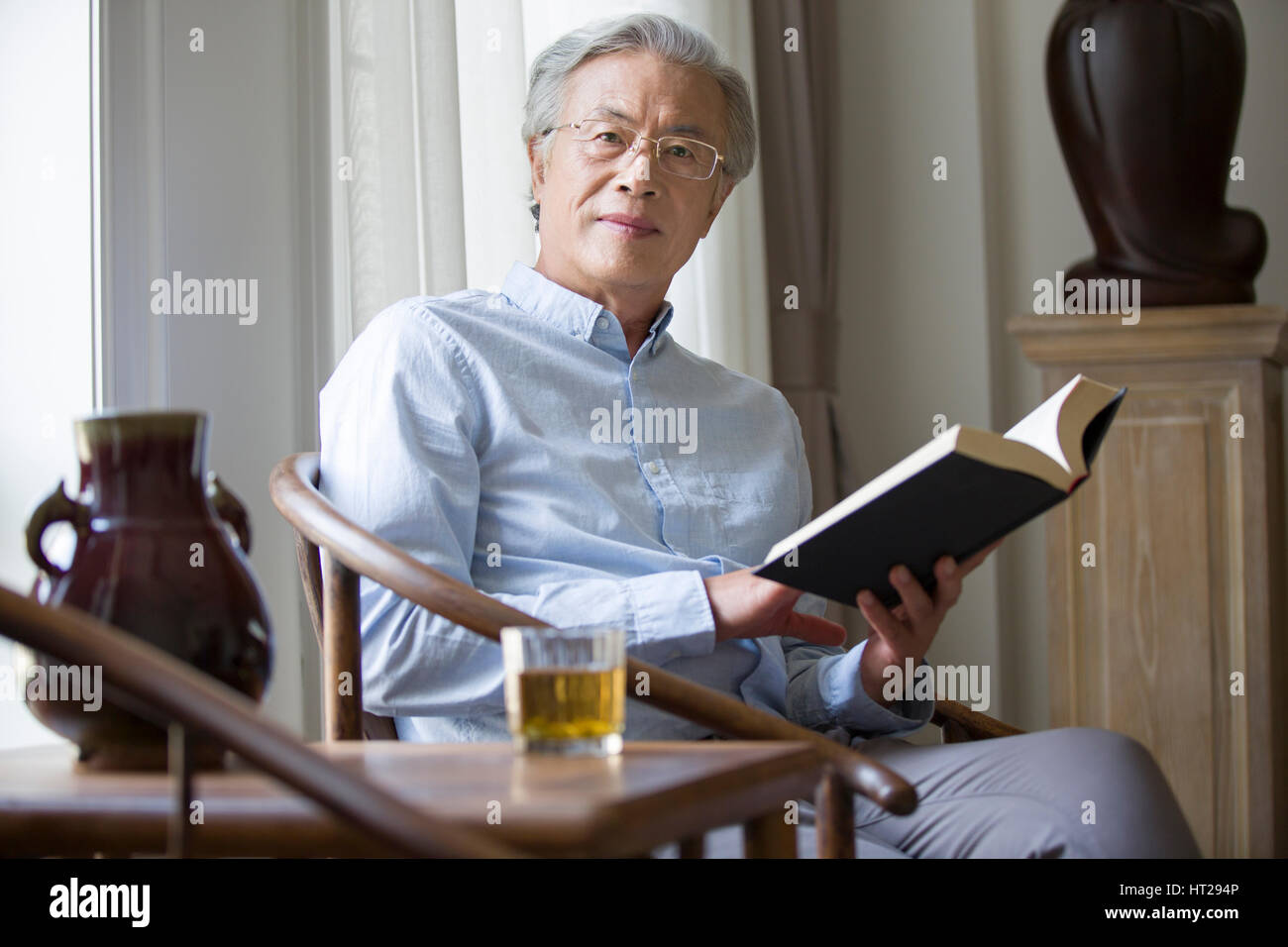 Serene image man reading hi-res stock photography and images - Alamy