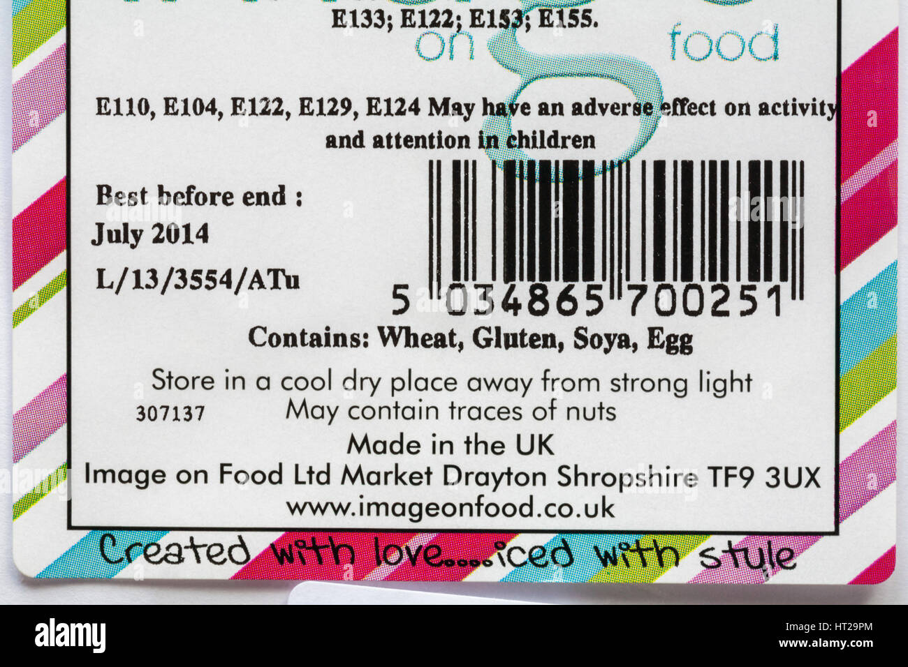 Information showing E numbers may have an adverse effect on activity and attention in children. Contains wheat gluten soya egg. Made in the UK. Food Stock Photo