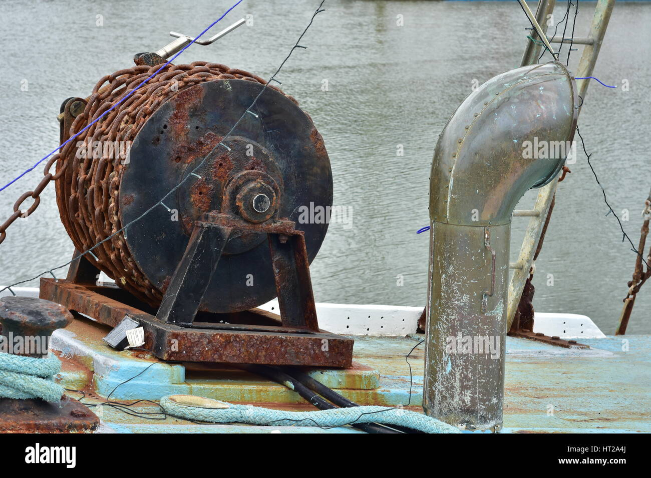 Detail of rusty chain winch on board of commercial fishing vessel. Stock Photo
