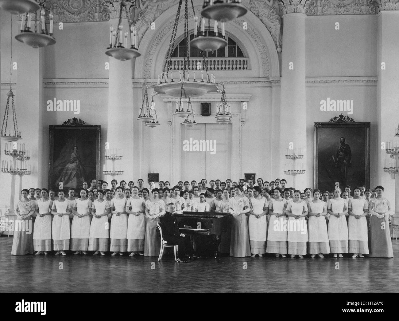 Pupils of the Smolny Institute for Noble Maidens at a Music Lesson, c. 1913. Artist: Bulla, Karl Karlovich (1853-1929) Stock Photo