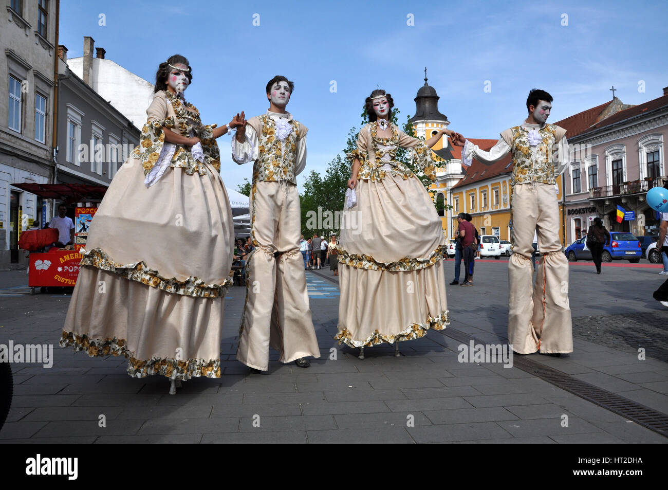 CLUJ NAPOCA - MAY 24: Theater group called Famous for Entertainment  performing street theater on stilts in medieval costumes, inside the  Man.In.Fest d Stock Photo - Alamy