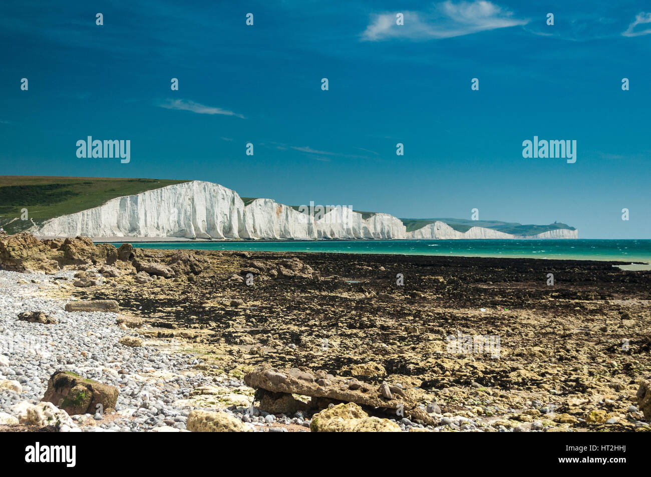 Cliffs known as the Seven Sisters from the beach at Hope Gap, adjacent to Seaford Head. The Seven Sisters are a famous landmark on the Sussex coast. Stock Photo